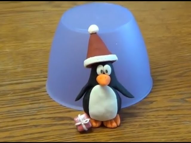Figuren modellieren: Pinguin mit Weihnachtsmütze Schritt für Schritt Anleitung