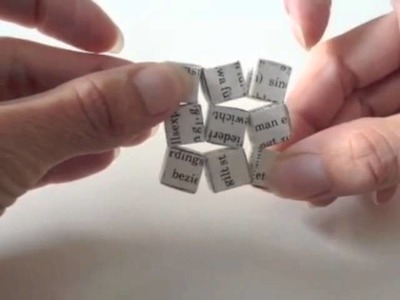 Buch trifft Schere. Ich hab's getan.  Origami Wobbling Wall of Nine Cubes (Heinz Strobl)