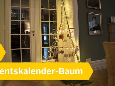 Adventskalender aus Birkenstämmen basteln – so geht's!