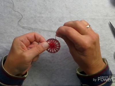 Raffhalter trifft Zwirnknopf
