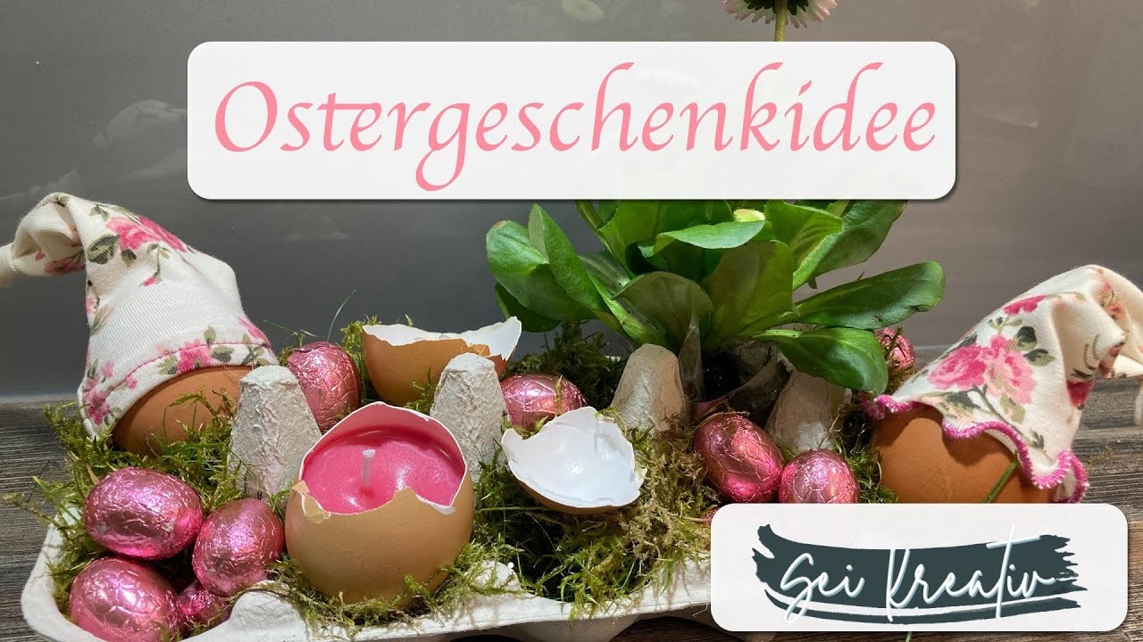 Ostergeschenkidee. Osternest. Nest. Geschenkbox. Blumen. Moos. Schokolade. Sei Kreativ