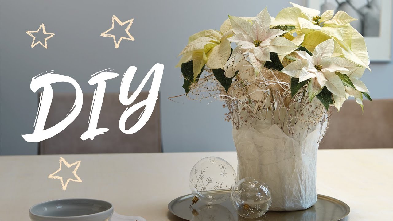 DIY adventliche Tischdeko: Weihnachtssternstrauß in zartem Papierlook