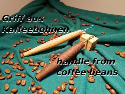 Häkelnadelgriff aus Kaffeebohnen. Crochet hook made from coffee beans