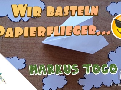 Wir basteln Papierflieger. 