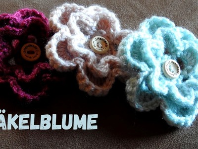 Häkelblume für Babymützen oder Kleidchen