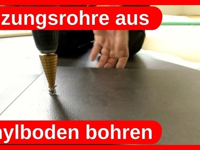 Heizungsrohre aus Vinylboden mit einem Stufenbohrer bohren. Trockenbau - Dachausbau DIY
