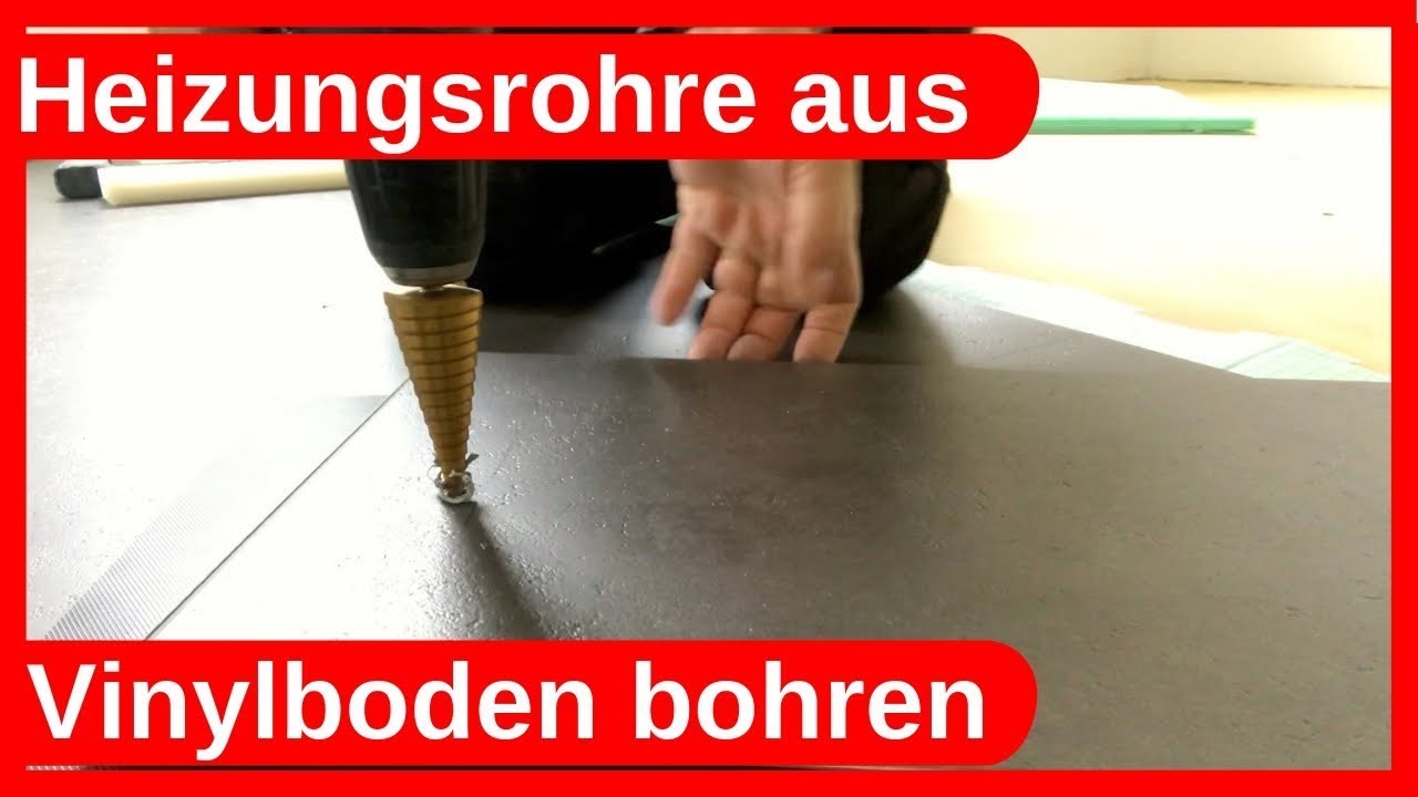 Heizungsrohre aus Vinylboden mit einem Stufenbohrer bohren. Trockenbau - Dachausbau DIY