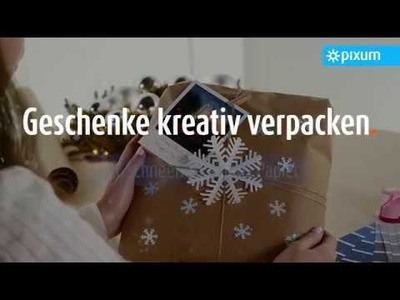 Geschenke weihnachtlich verzieren |  DIY Schneeflocken aus Papier