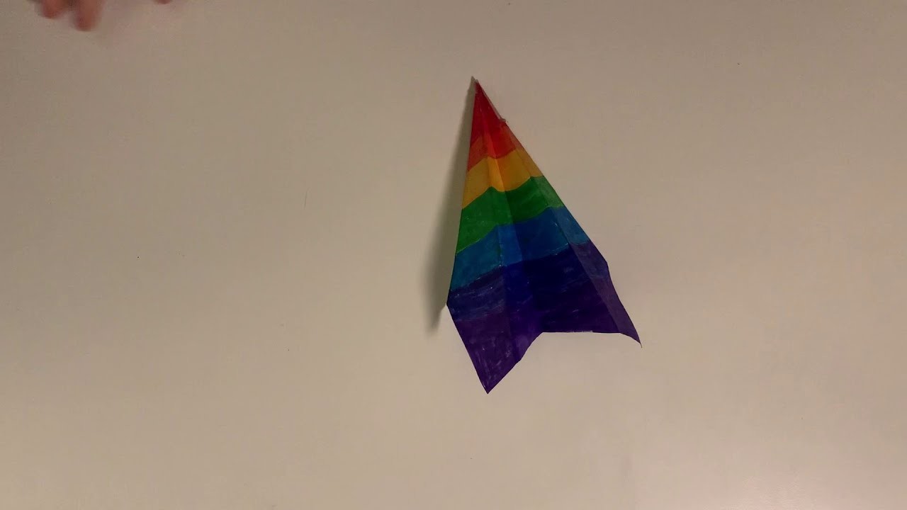 Papierflieger mit Fallschirm