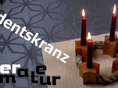 Rustikaler Adventskranz. Kerzenständer