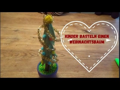 Kinder basteln einen Weihnachtsbaum in zehn Minuten ????