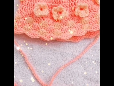 Häkeln baby mütze mit muschelmuster. crochet hand made baby hat with flowers on