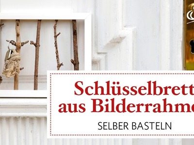 Schlüsselbrett aus Bilderrahmen und Zweigen basteln