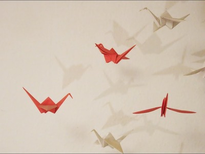 (2. - 4. Klasse)  Falten. Origami-Kranich aus Papier . Kunst. Bastelprojekt in der Grundschule