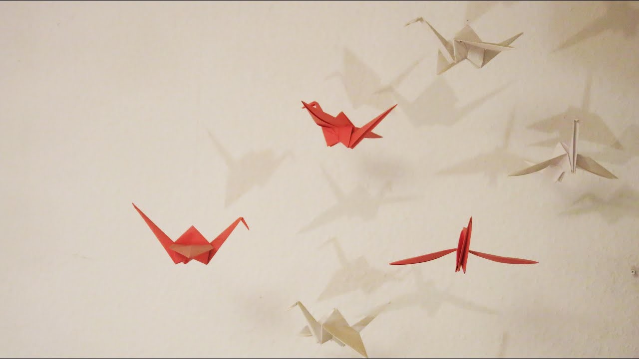 (2. - 4. Klasse)  Falten. Origami-Kranich aus Papier . Kunst. Bastelprojekt in der Grundschule