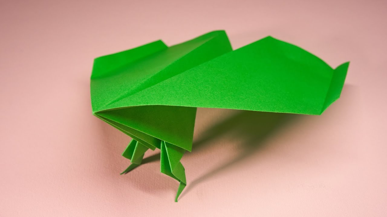 Papierflugzeug mit zwei Beinen. Papierflieger selbst basteln. Beste Origami Flugzeug
