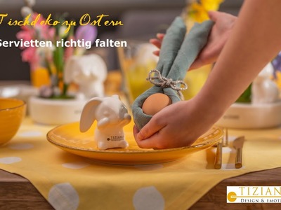 Tischdeko zu Ostern: Servietten als Hasenohren faltern