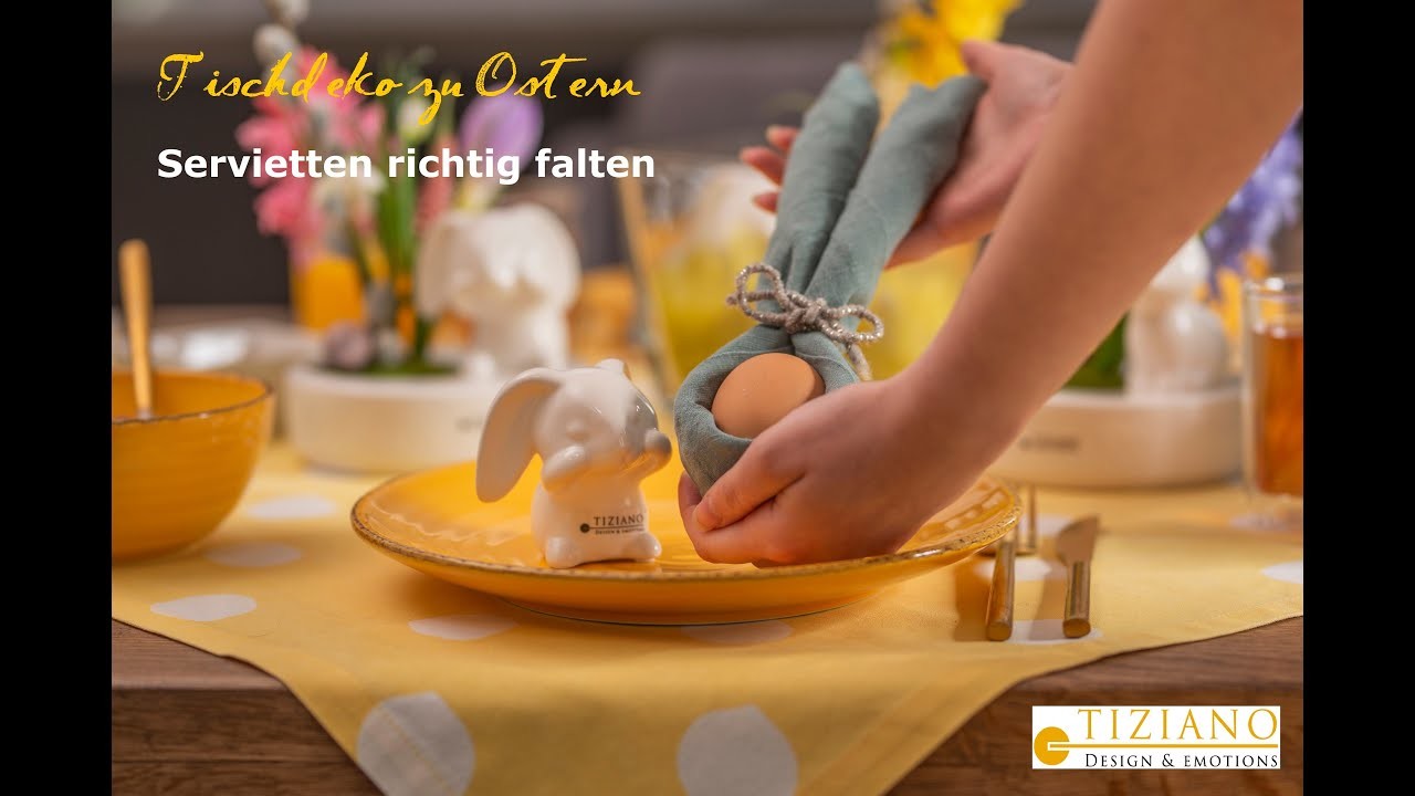 Tischdeko zu Ostern: Servietten als Hasenohren faltern