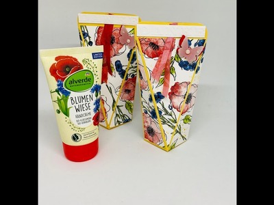 Selbstschließende Schachtel für Handcreme. Mit Wildblumen