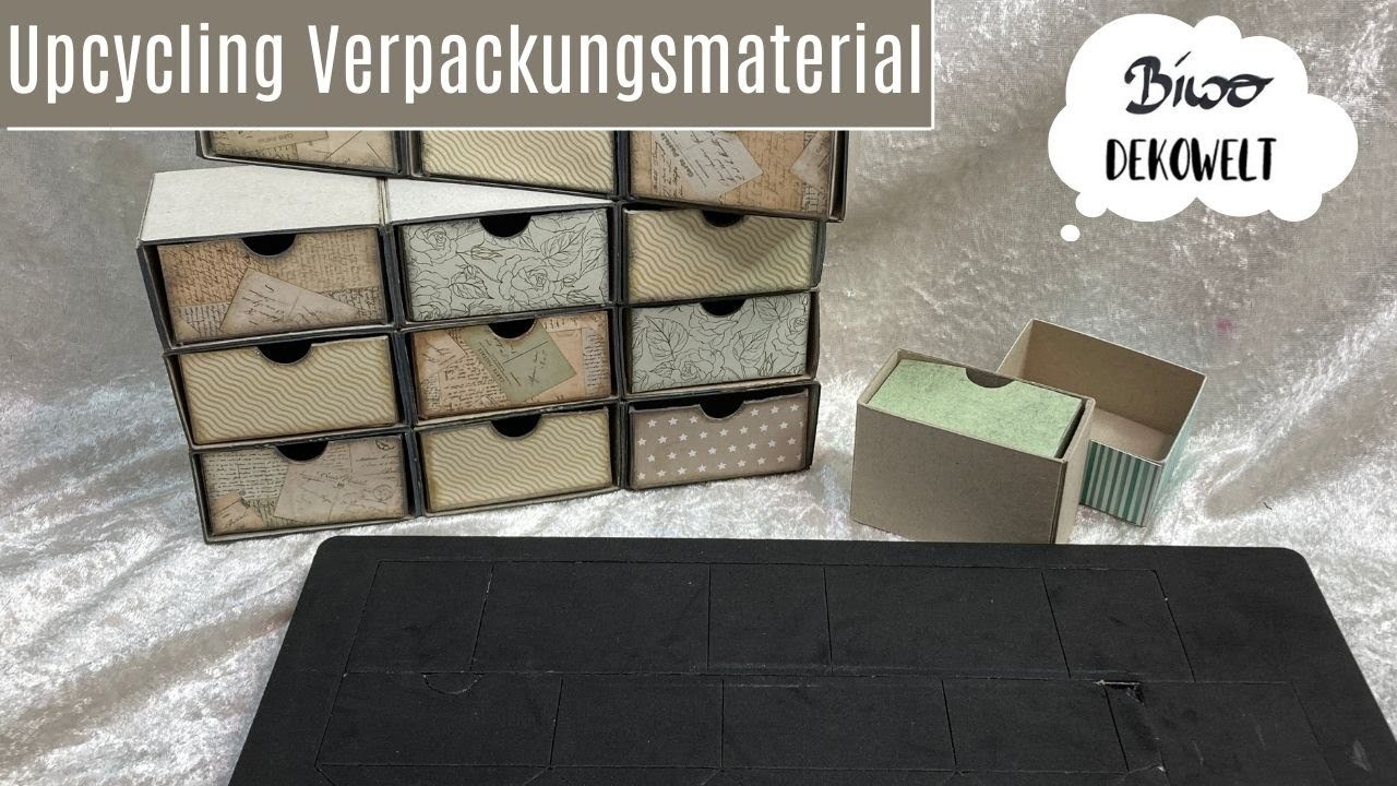 Schubladenbox mit Scoarboard von Eileen Hull. Upcycling Verpackungsmaterial